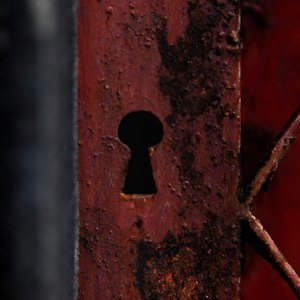 A keyhole in a door, symbolising discreet extra marital affair guidance